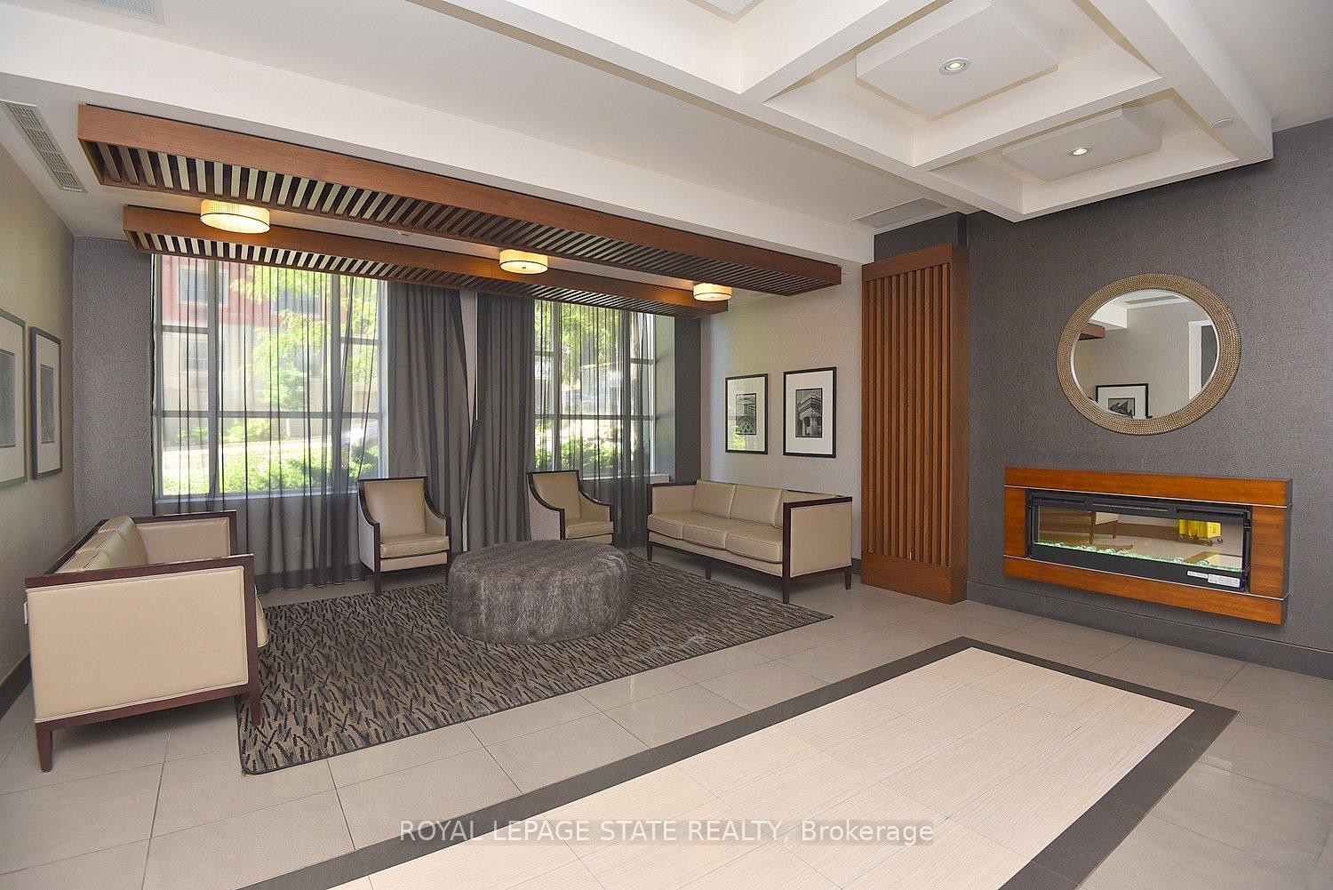 603-150 Main Street W, Hamilton, ON - Indoor With Fireplace