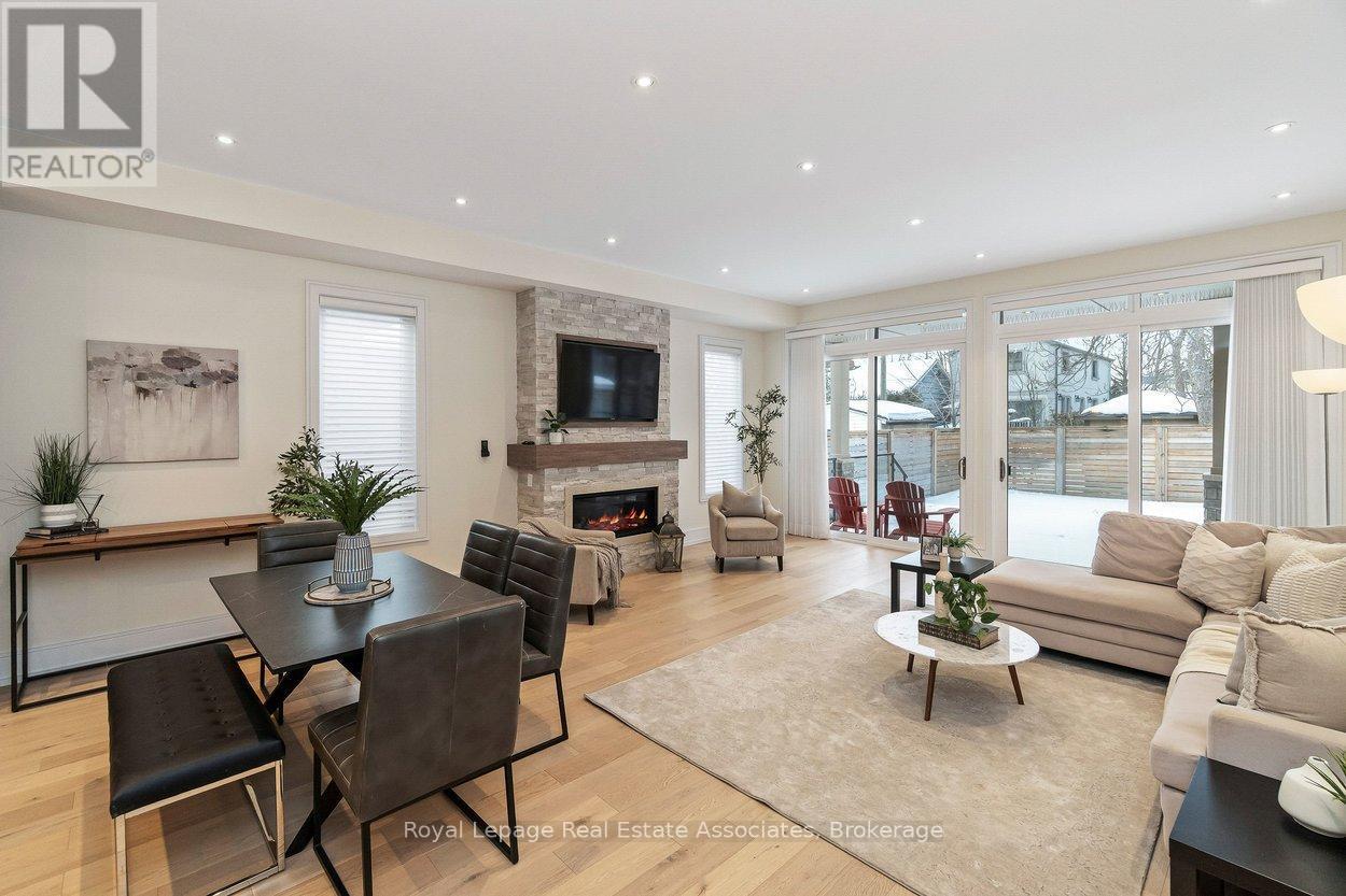 Dining Area - 63 Troy Street, Mississauga, ON - Indoor Photo Showing Living Room With Fireplace