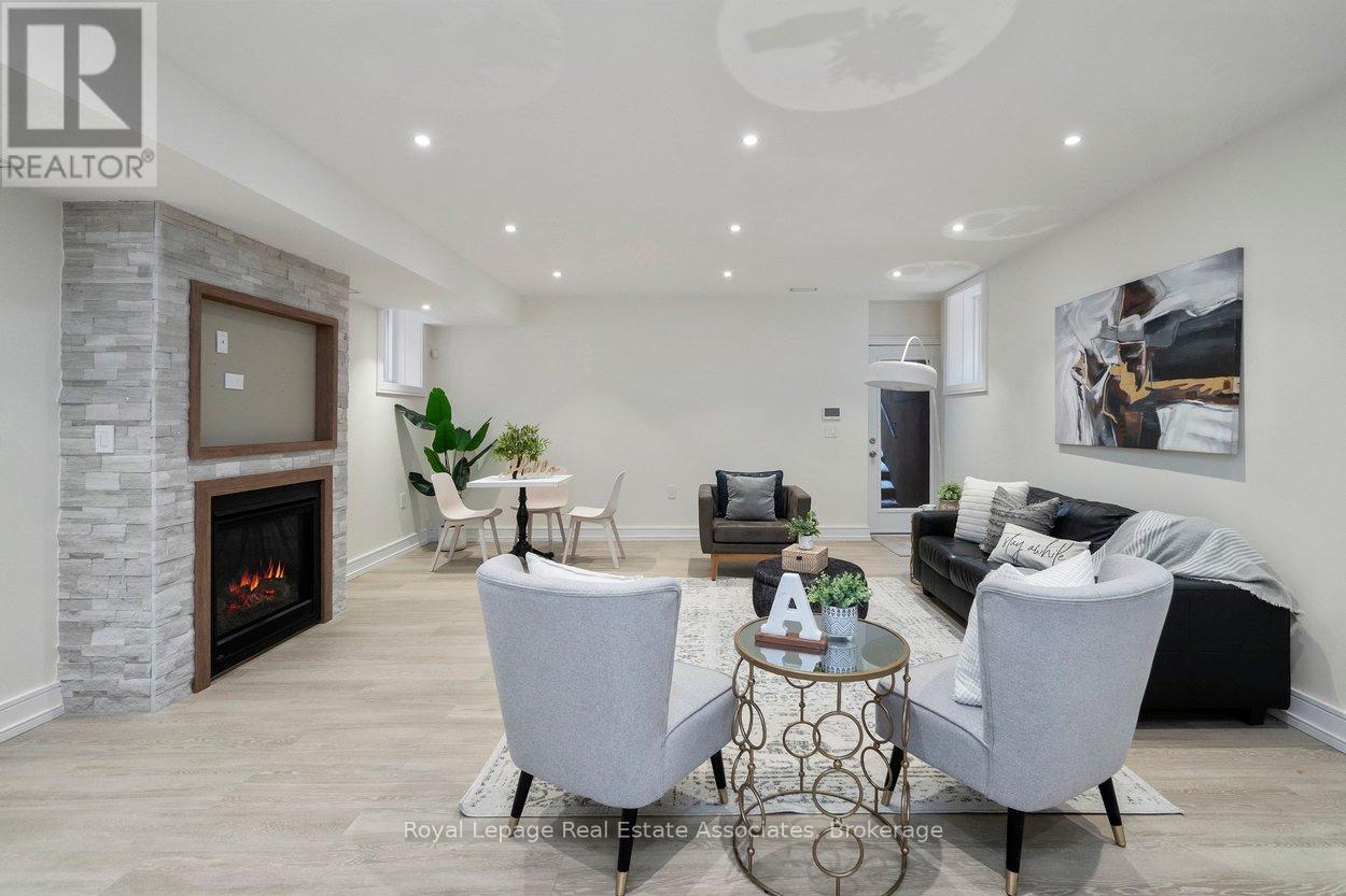 Family Room - 63 Troy Street, Mississauga, ON - Indoor Photo Showing Living Room With Fireplace