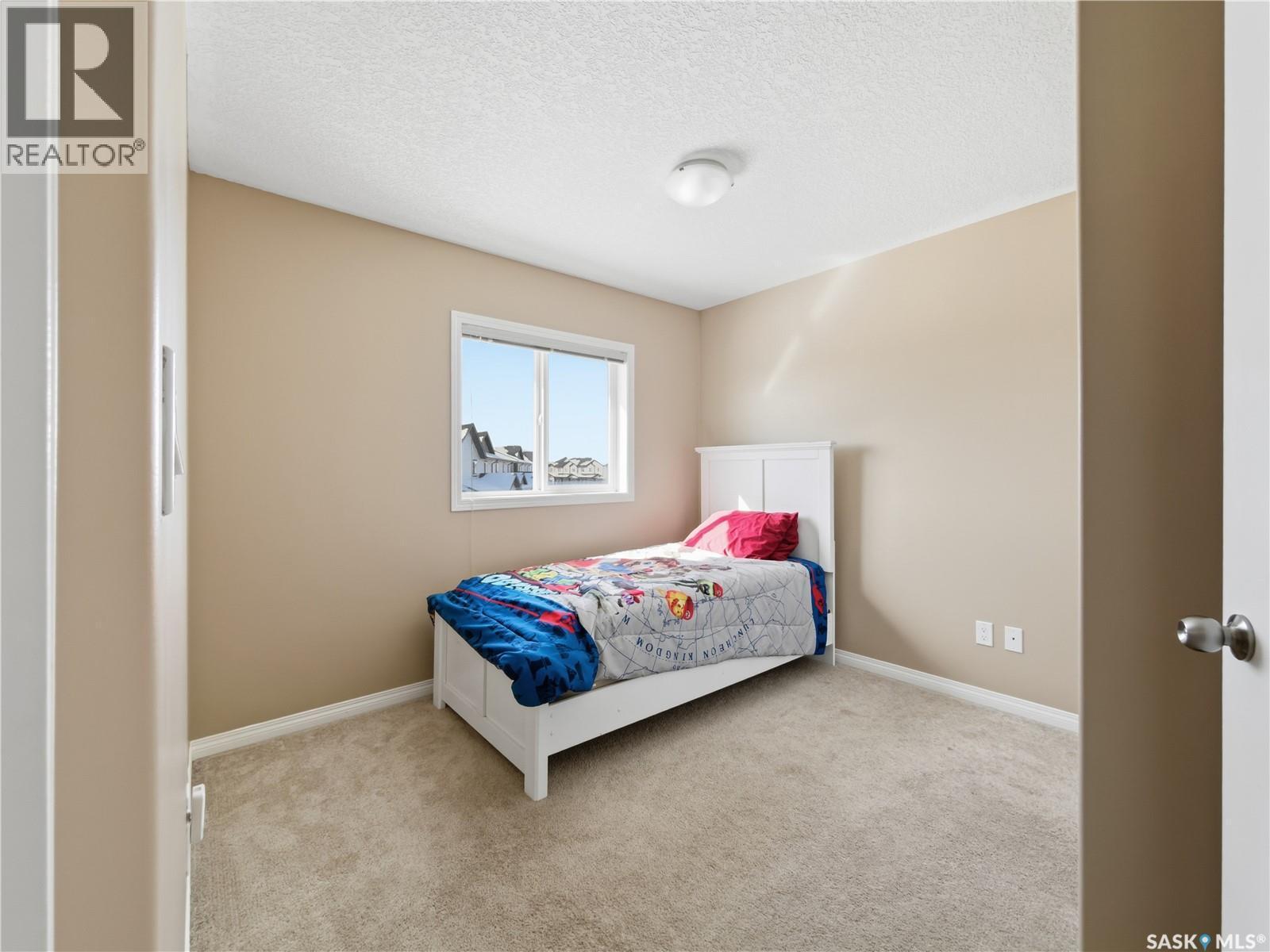 209 3818 Dewdney Avenue E, Regina, SK - Indoor Photo Showing Bedroom