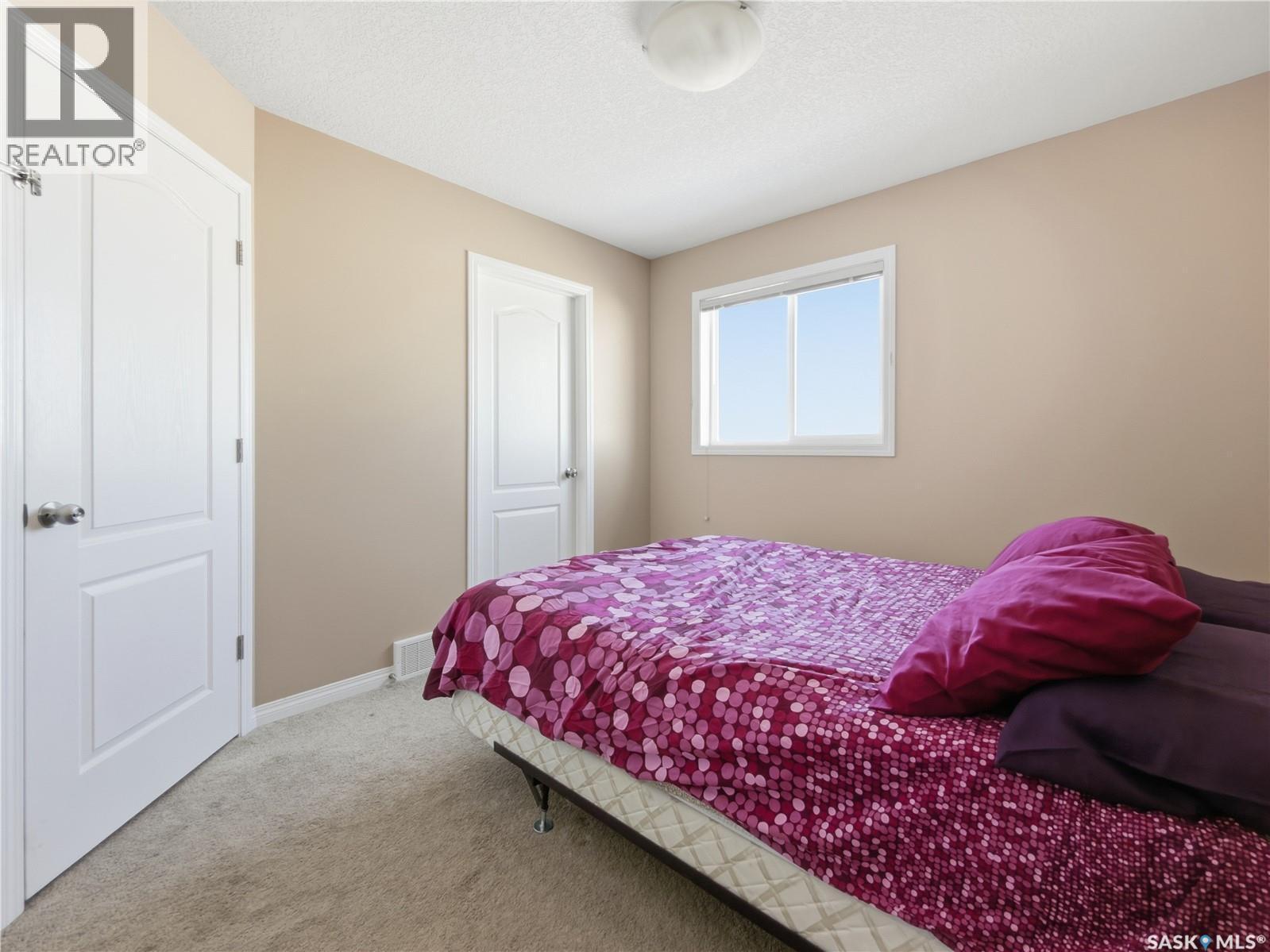 209 3818 Dewdney Avenue E, Regina, SK - Indoor Photo Showing Bedroom