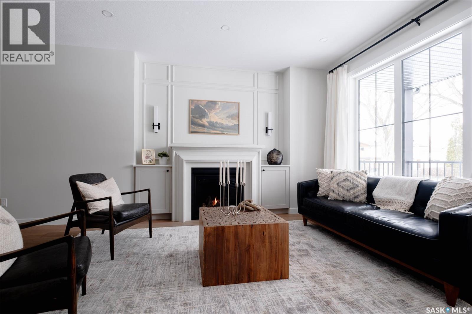 2808 Fleury Street, Regina, SK - Indoor Photo Showing Living Room With Fireplace