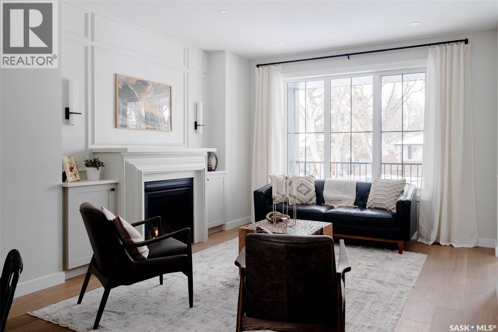 2808 Fleury Street, Regina, SK - Indoor Photo Showing Living Room With Fireplace
