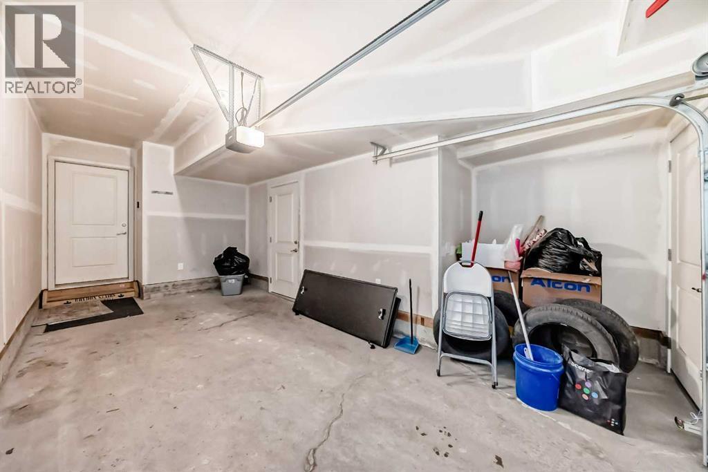263 Redstone Boulevard Ne, Calgary, AB - Indoor Photo Showing Garage