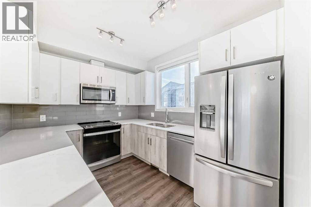 263 Redstone Boulevard Ne, Calgary, AB - Indoor Photo Showing Kitchen With Double Sink With Upgraded Kitchen