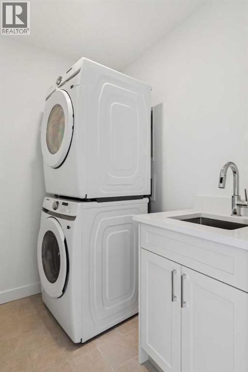 25 Linden Place, Rural Red Deer County, AB - Indoor Photo Showing Laundry Room