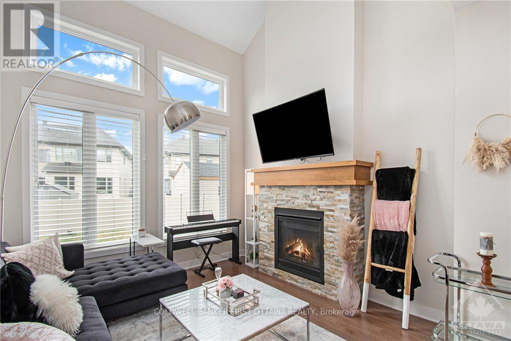 427 Rainrock Crescent, Ottawa, ON - Indoor Photo Showing Living Room With Fireplace