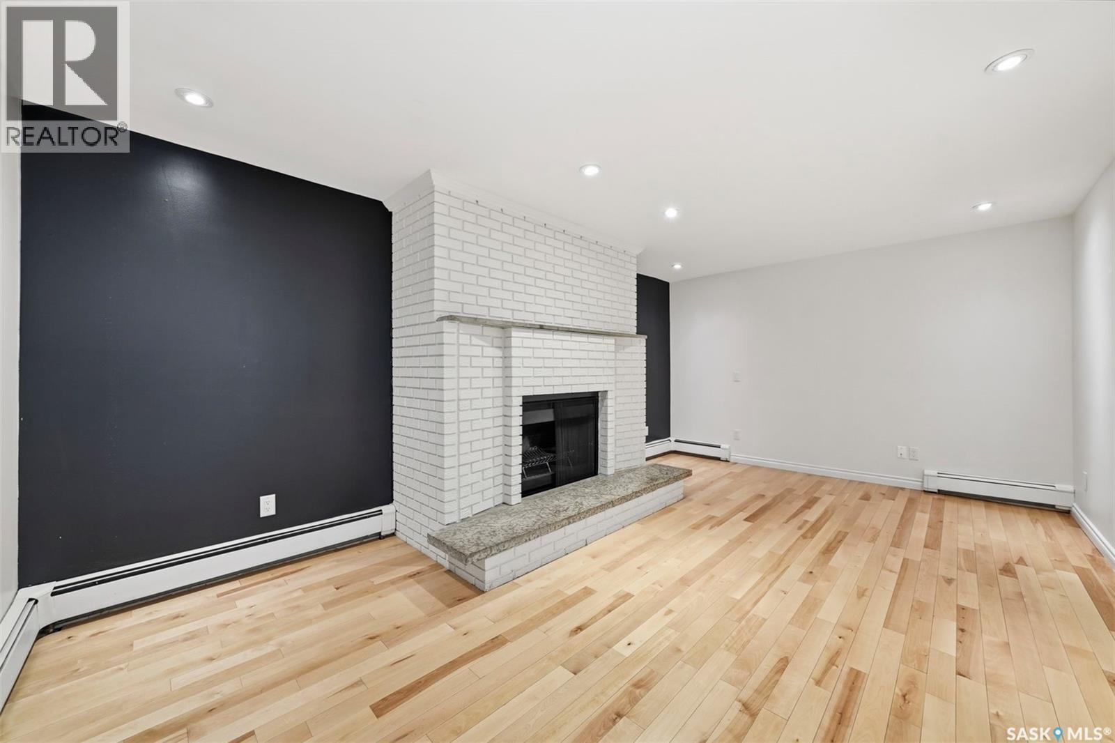 419 Chitek Crescent, Saskatoon, SK - Indoor With Fireplace