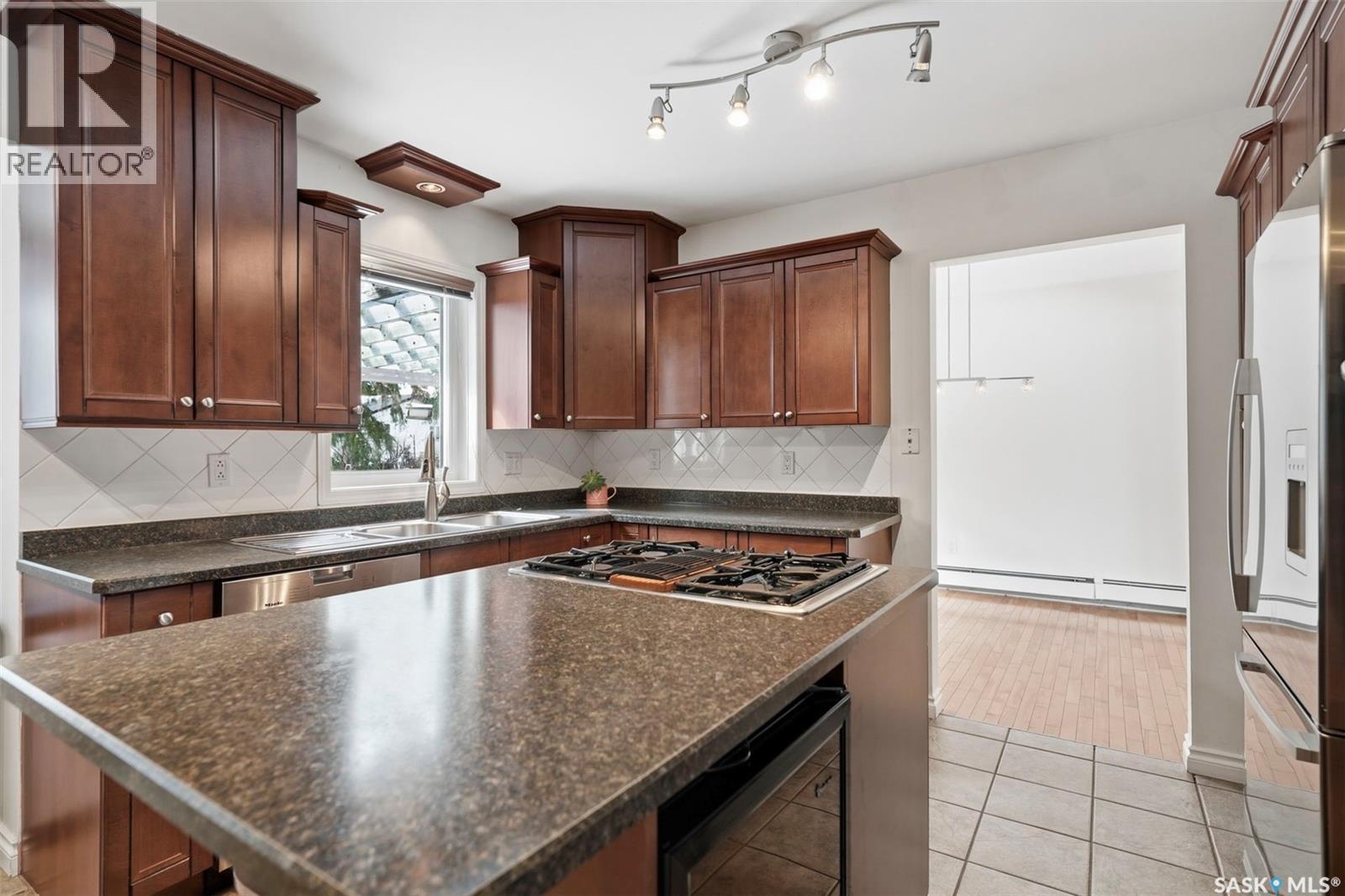 419 Chitek Crescent, Saskatoon, SK - Indoor Photo Showing Kitchen With Double Sink