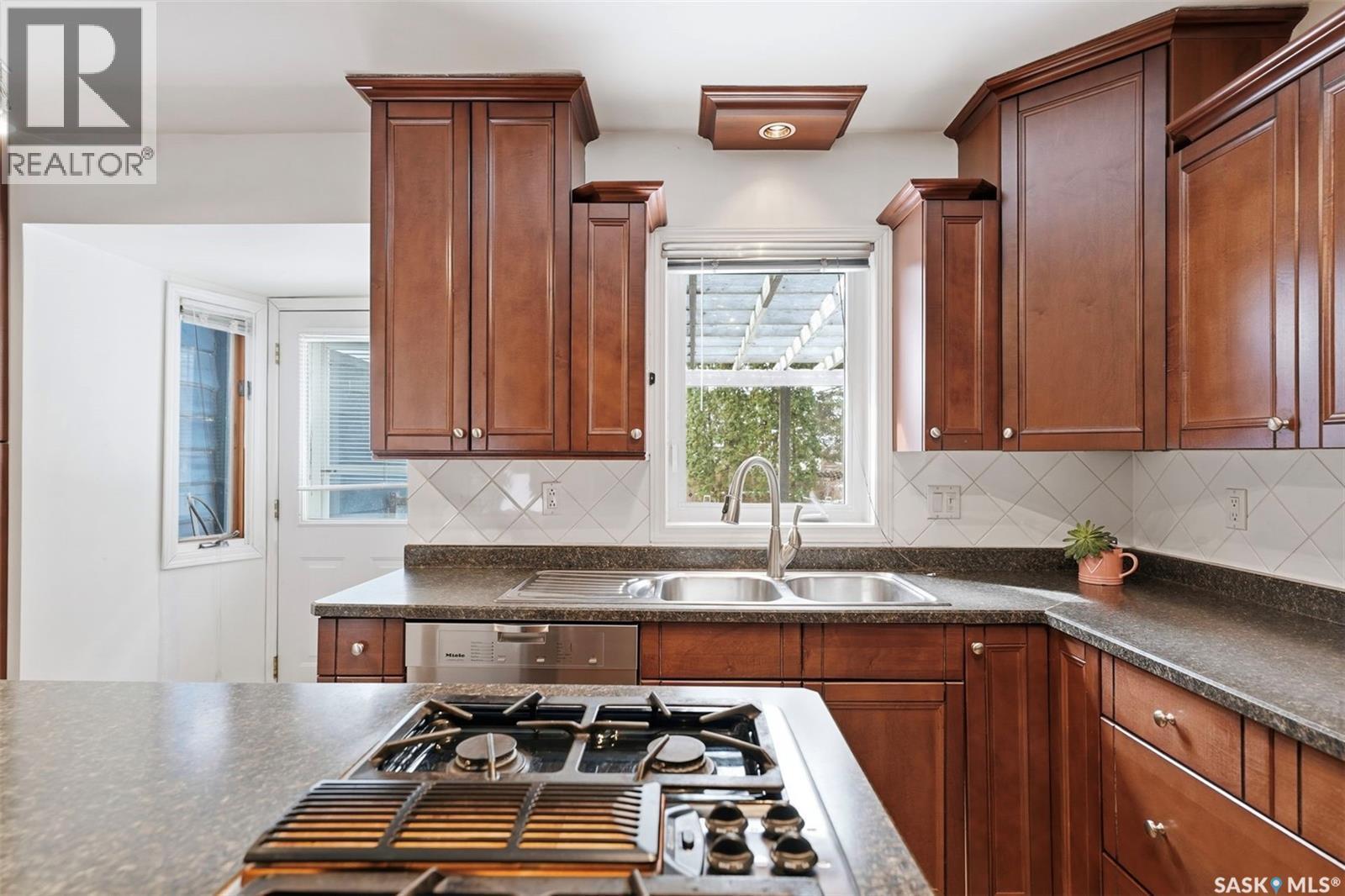 419 Chitek Crescent, Saskatoon, SK - Indoor Photo Showing Kitchen With Double Sink