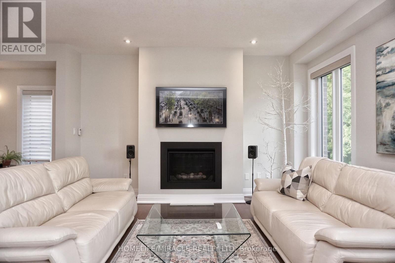 63 Ian Ormston Drive, Kitchener, ON - Indoor Photo Showing Living Room With Fireplace