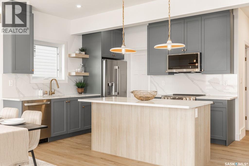 307 Sharma Crescent, Saskatoon, SK - Indoor Photo Showing Kitchen With Upgraded Kitchen