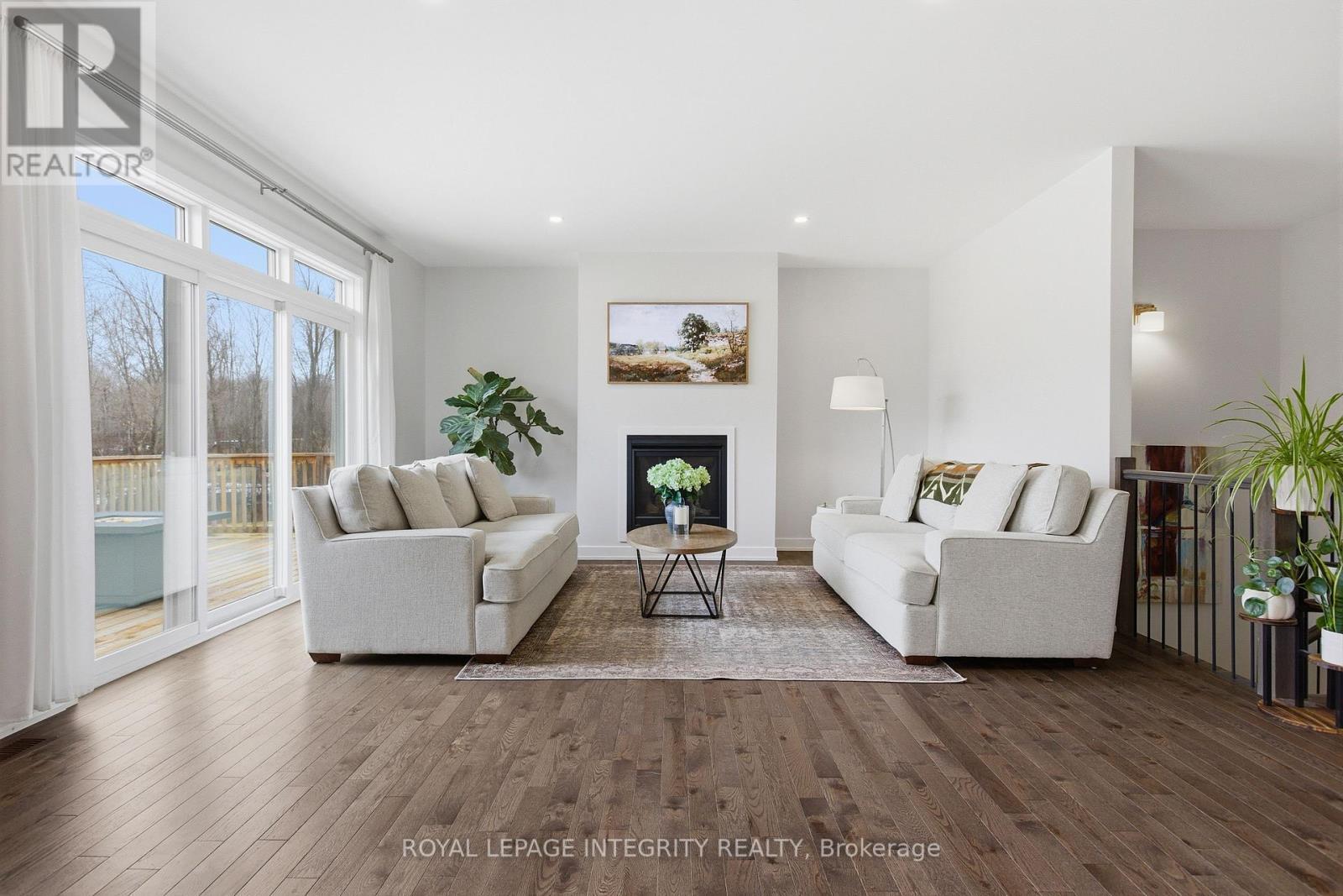 444 Ejs Lane, Beckwith, ON - Indoor Photo Showing Living Room With Fireplace