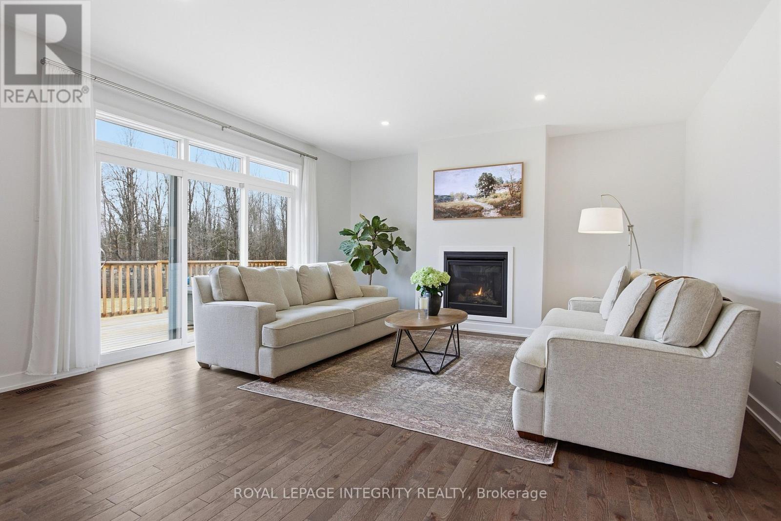 444 Ejs Lane, Beckwith, ON - Indoor Photo Showing Living Room With Fireplace