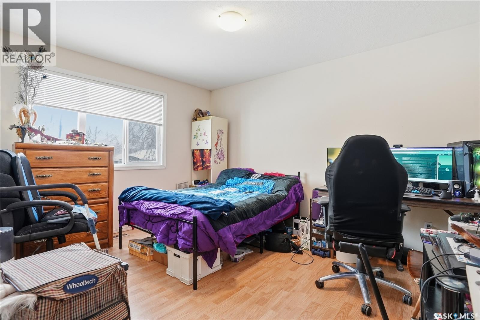 222 V Avenue S, Saskatoon, SK - Indoor Photo Showing Bedroom