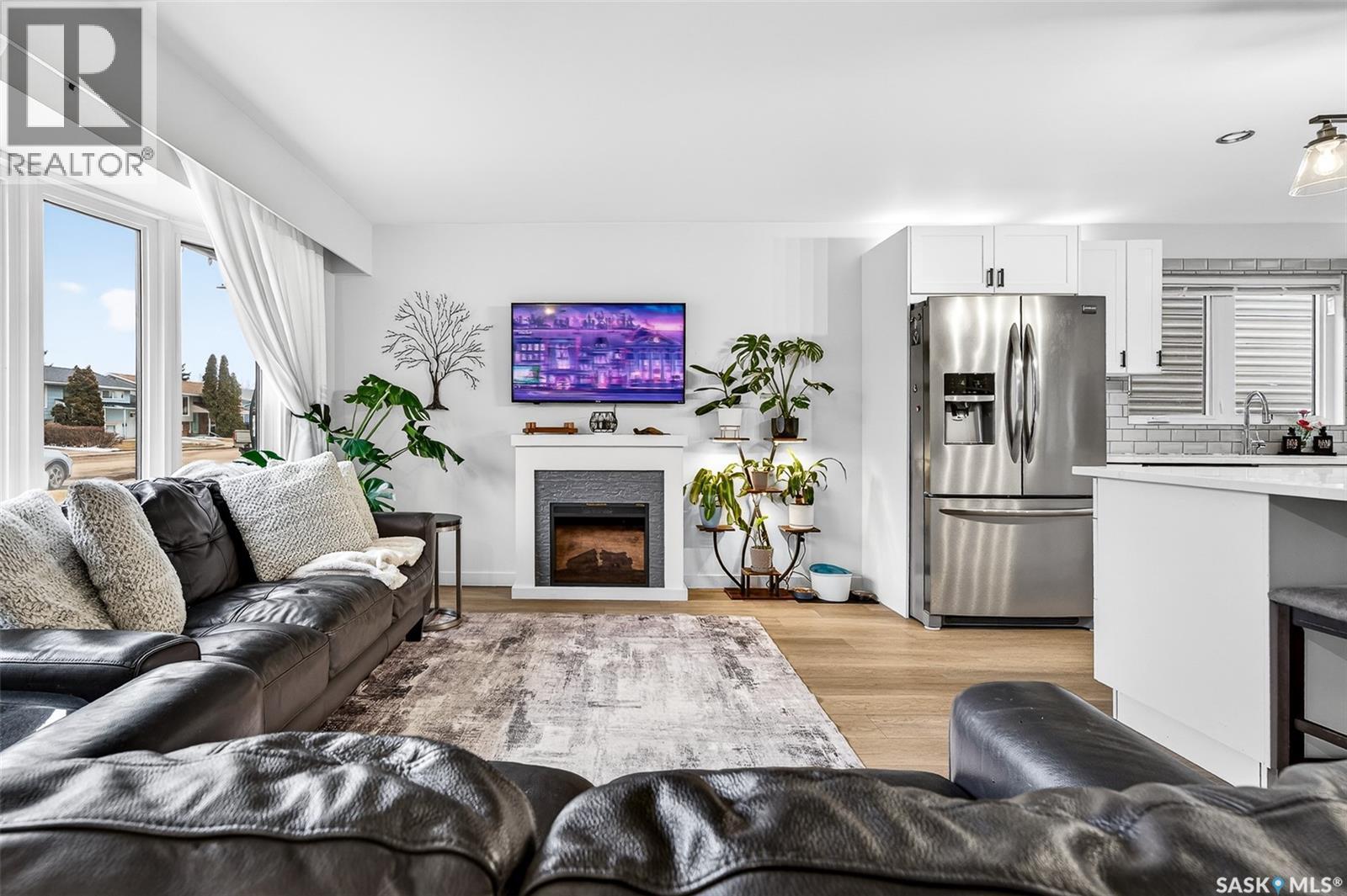 1365 Prince Crescent, Moose Jaw, SK - Indoor Photo Showing Living Room With Fireplace