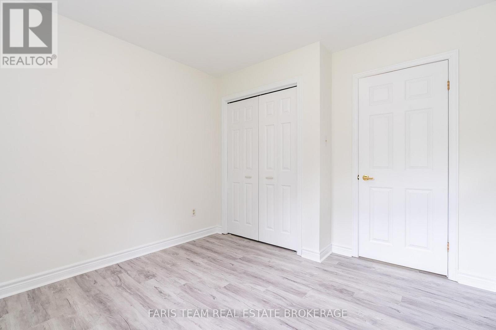 19 Wakunda Crescent, Tiny, ON - Indoor Photo Showing Other Room