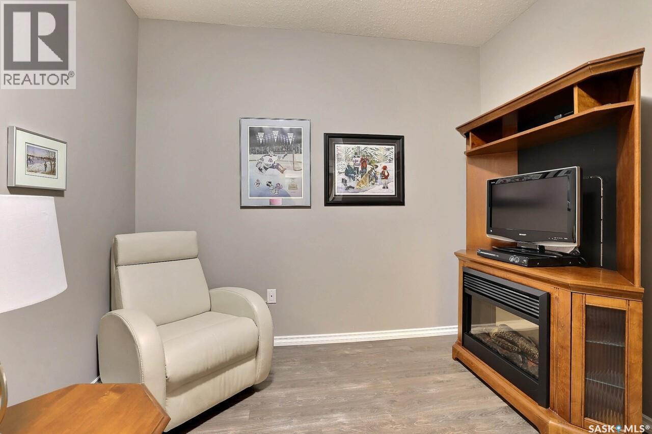 201 4721 Mctavish Street, Regina, SK - Indoor With Fireplace