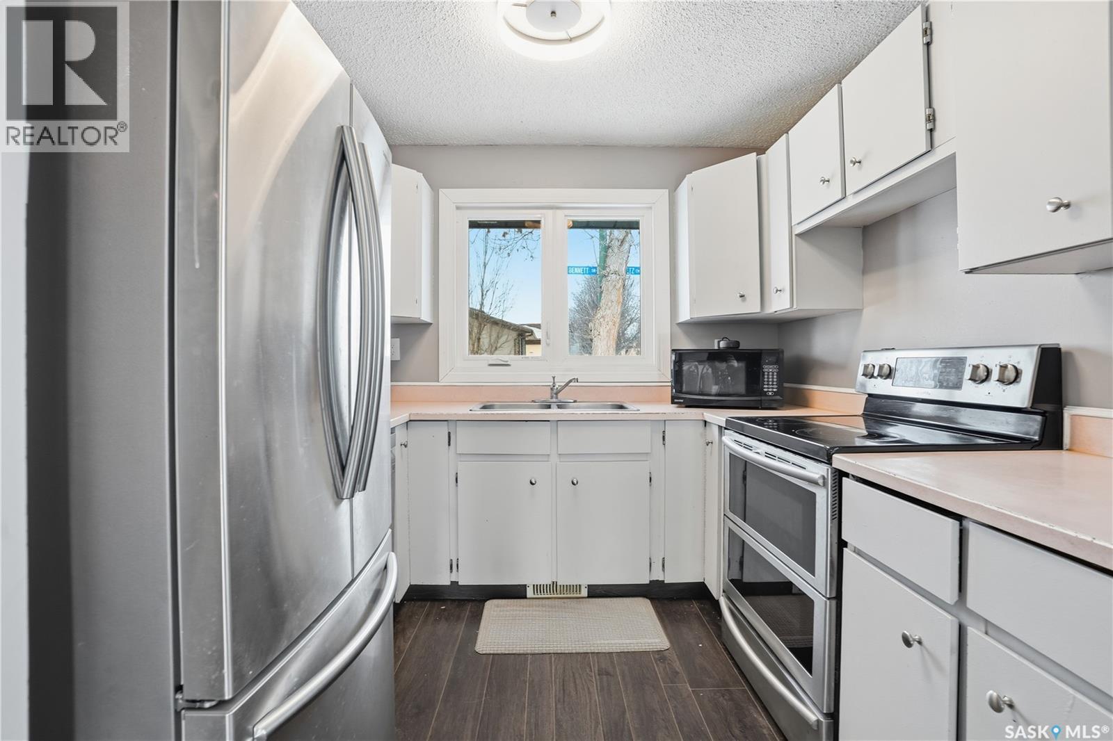 7203 Bennett Drive, Regina, SK - Indoor Photo Showing Kitchen With Stainless Steel Kitchen With Double Sink