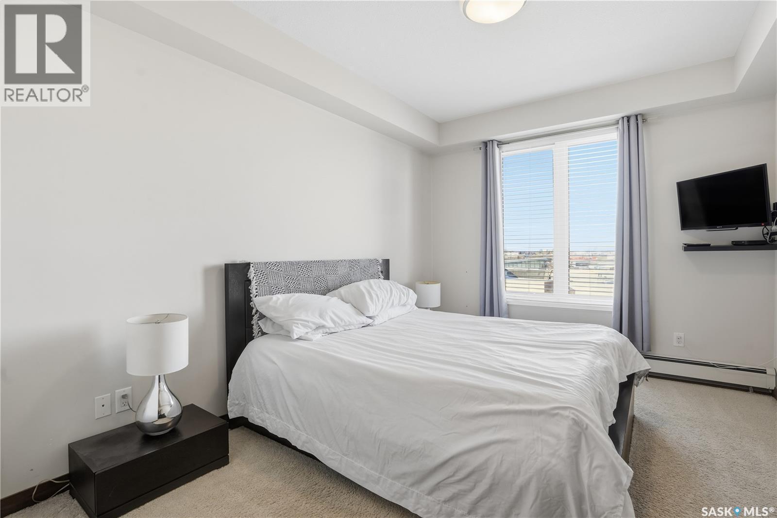 414 2101 Heseltine Road, Regina, SK - Indoor Photo Showing Bedroom