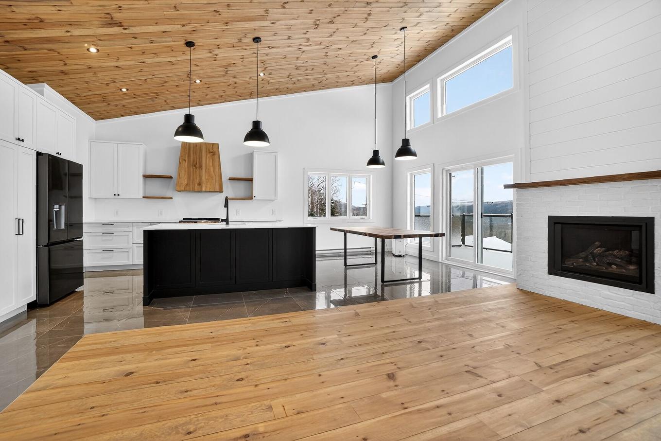 Living room - 140 Ch. De L'Altitude, Saint-Côme, QC - Indoor With Fireplace