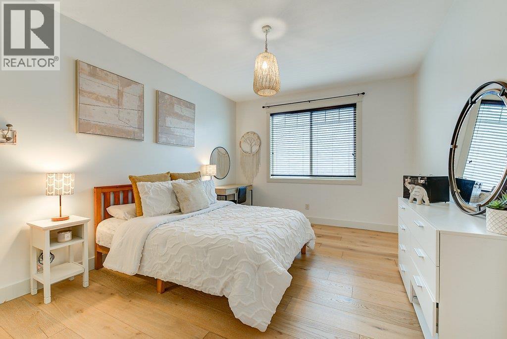 Upper level bedroom 1 - 425 Audubon Court, Kelowna, BC - Indoor Photo Showing Bedroom