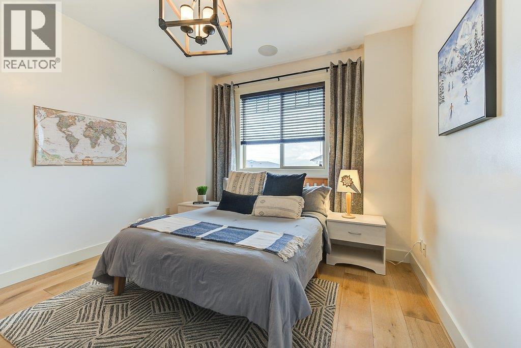 Upper level bedroom 2 - 425 Audubon Court, Kelowna, BC - Indoor Photo Showing Bedroom