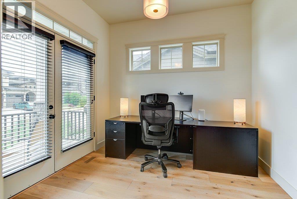 Main Floor Den, with access to front porch - 425 Audubon Court, Kelowna, BC - Indoor Photo Showing Office