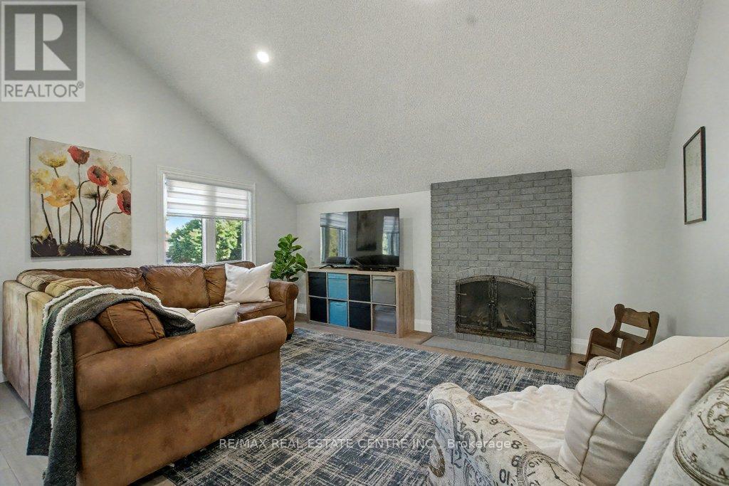 166 Westvale Drive, Waterloo, ON - Indoor Photo Showing Living Room With Fireplace
