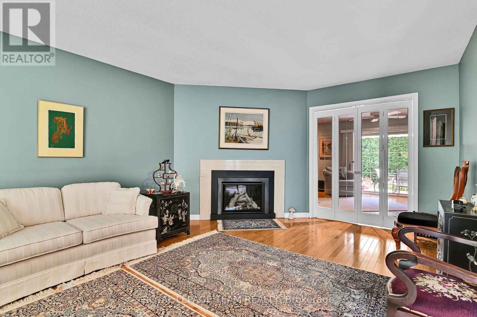 64 Lillico Drive, Ottawa, ON - Indoor Photo Showing Living Room With Fireplace