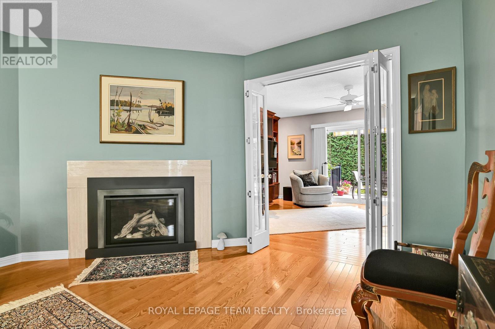 64 Lillico Drive, Ottawa, ON - Indoor Photo Showing Living Room With Fireplace
