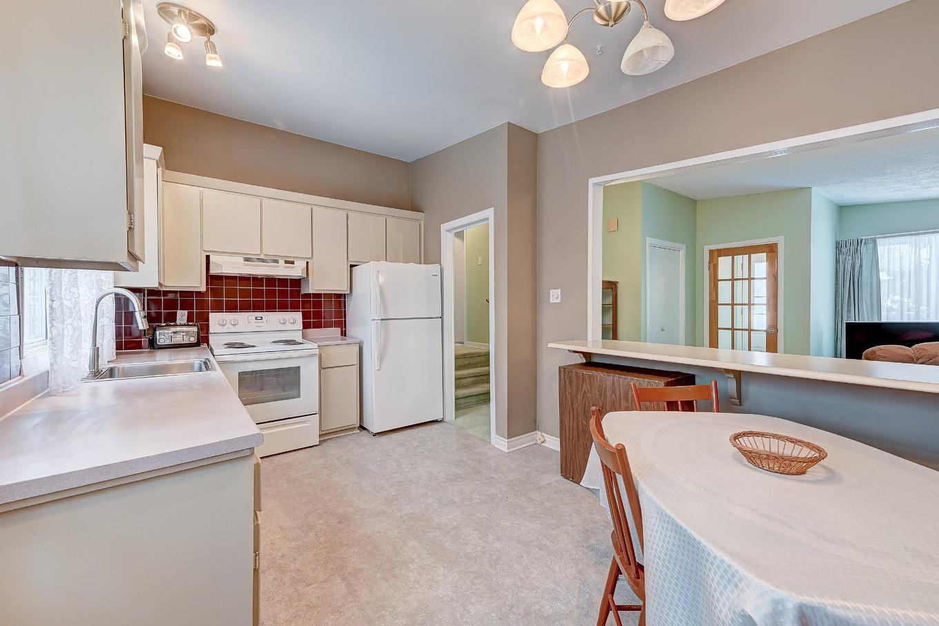 Cuisine - 6000 Rue Verlaine, Brossard, QC - Indoor Photo Showing Kitchen