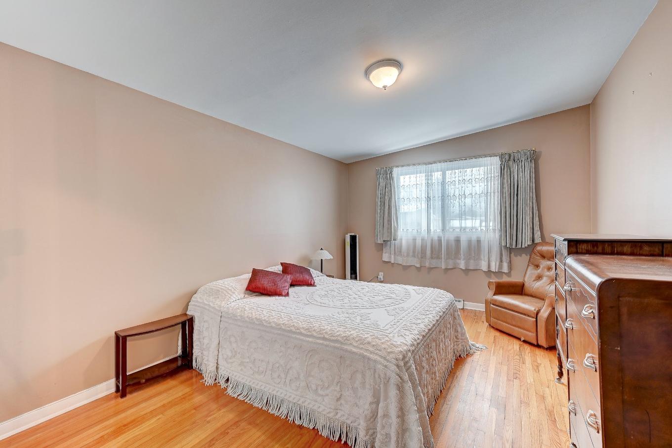 Chambre à coucher principale - 6000 Rue Verlaine, Brossard, QC - Indoor Photo Showing Bedroom