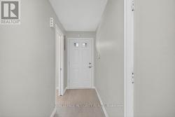 Front entrance with inside entry to garage. -