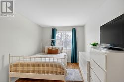 Virtually staged second bedroom -