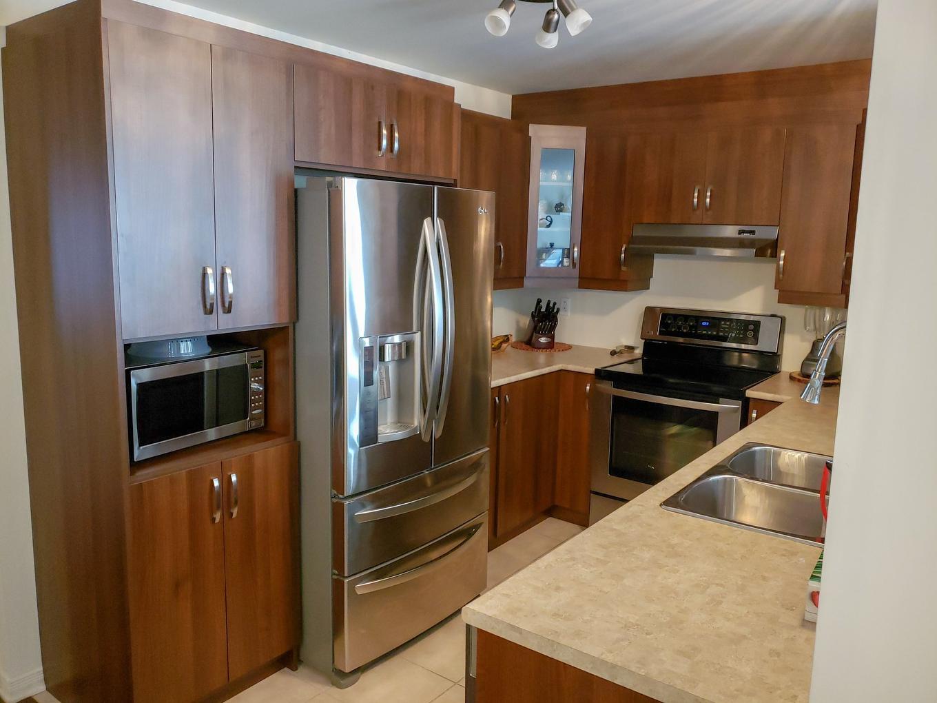 Cuisine - 3-6010 Boul. Chevrier, Brossard, QC - Indoor Photo Showing Kitchen With Double Sink