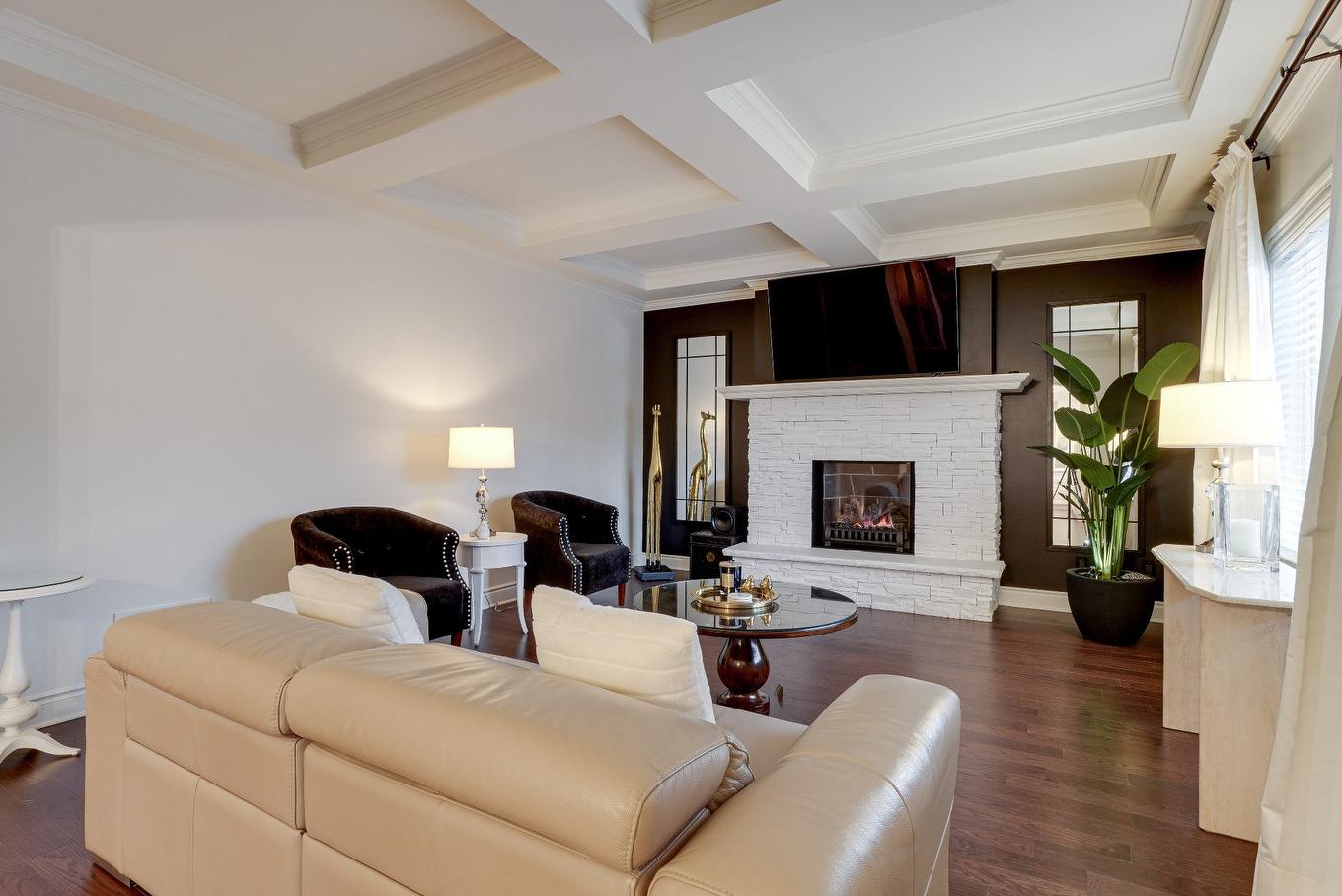 Living room - 7 Rue Hector-Maisonneuve, Blainville, QC - Indoor Photo Showing Living Room With Fireplace