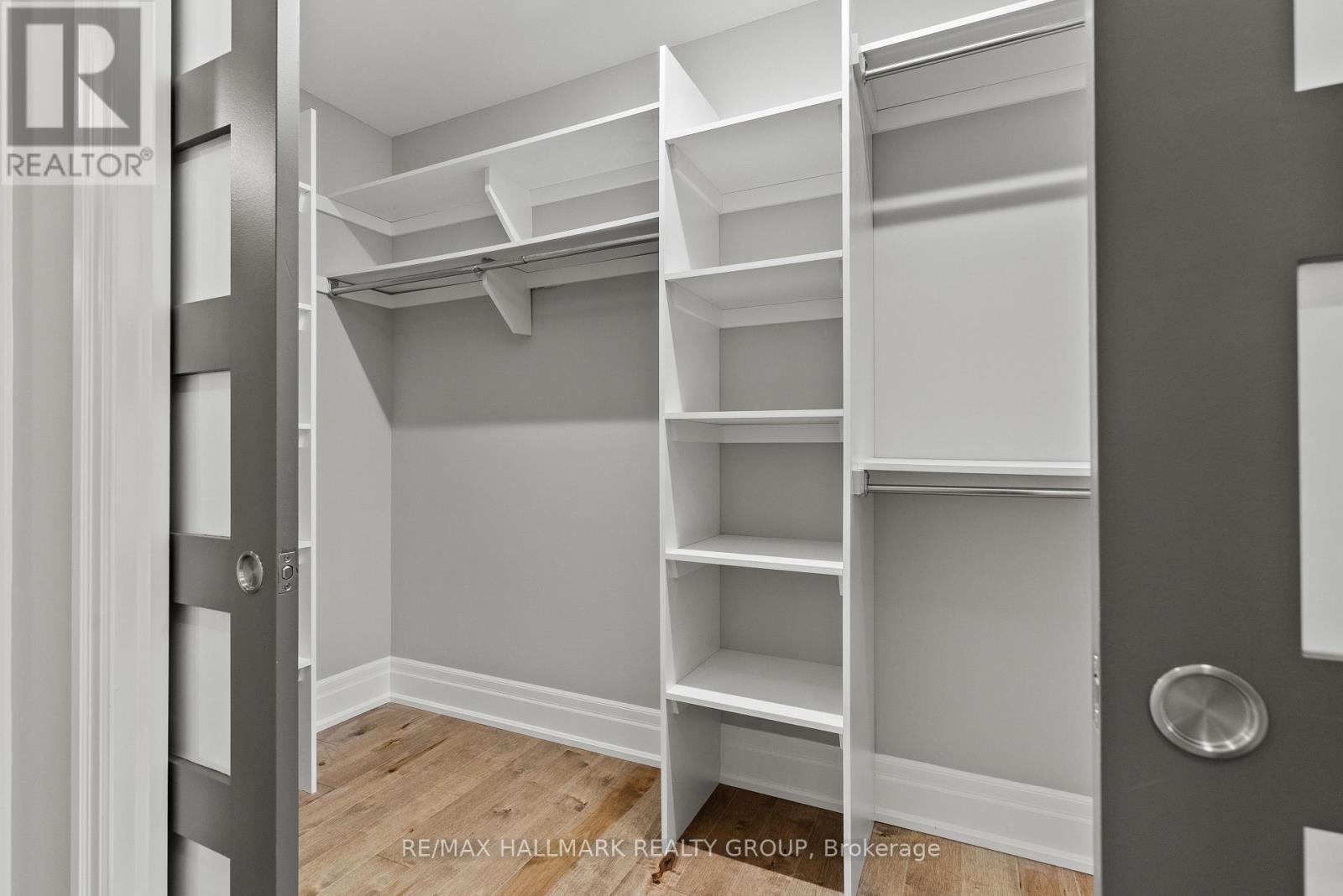 LARGE WALK-IN CLOSET (PRIMARY). - 217 Belford Crescent, Ottawa, ON - Indoor With Storage