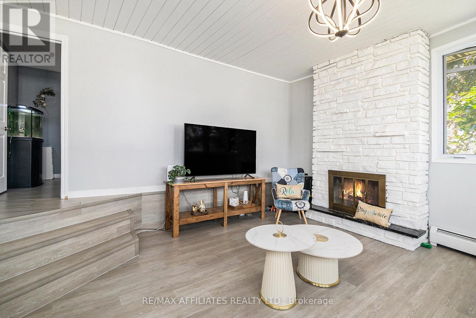170 Principale Road, The Nation, ON - Indoor Photo Showing Living Room With Fireplace