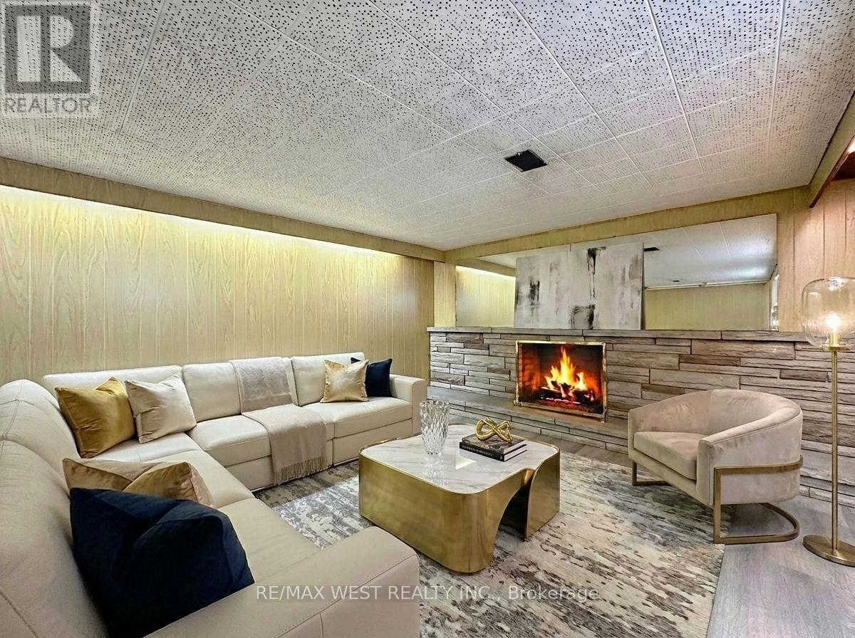 4 Kitson Drive, Toronto, ON - Indoor Photo Showing Living Room With Fireplace