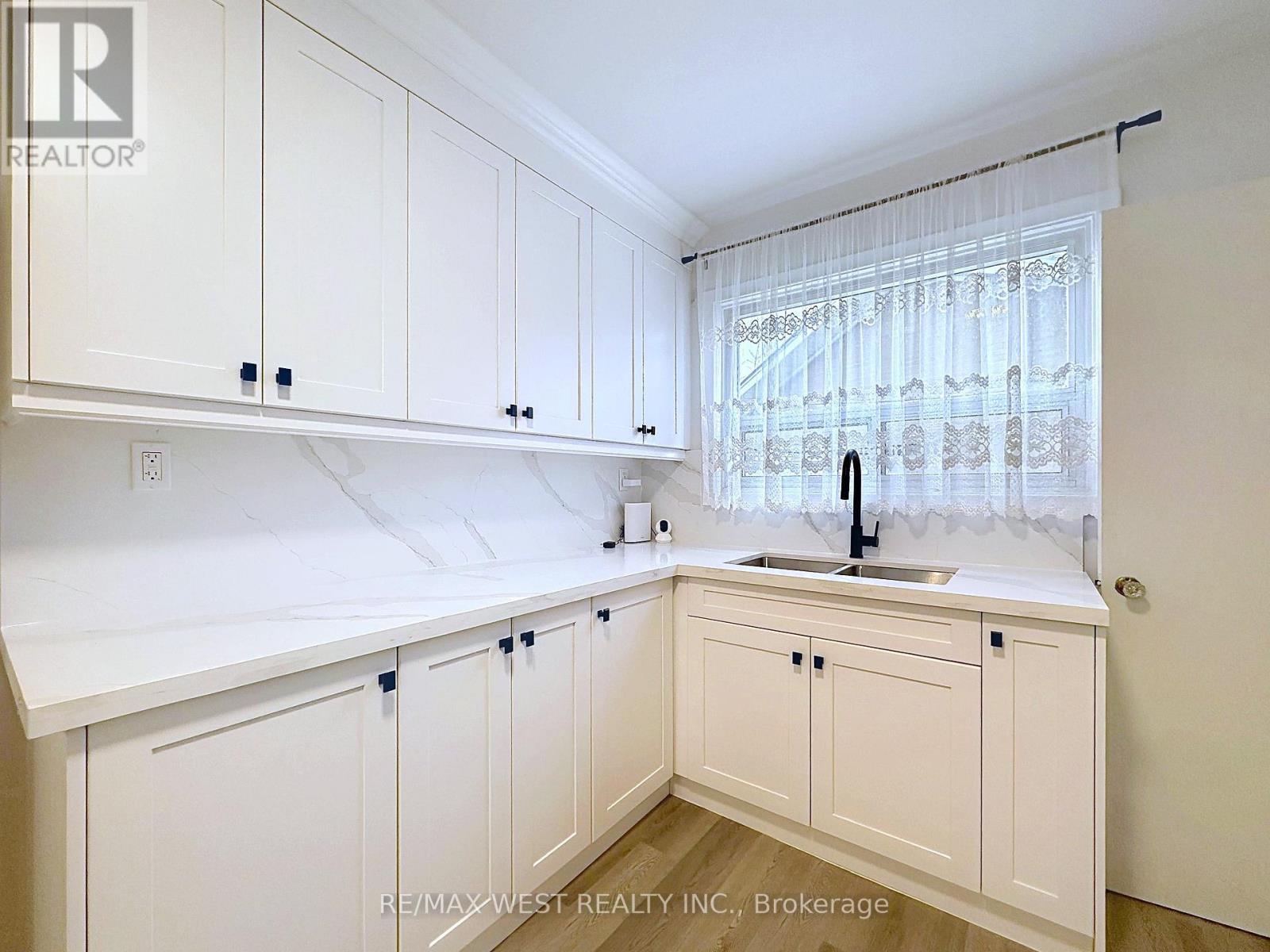 4 Kitson Drive, Toronto, ON - Indoor Photo Showing Kitchen With Double Sink