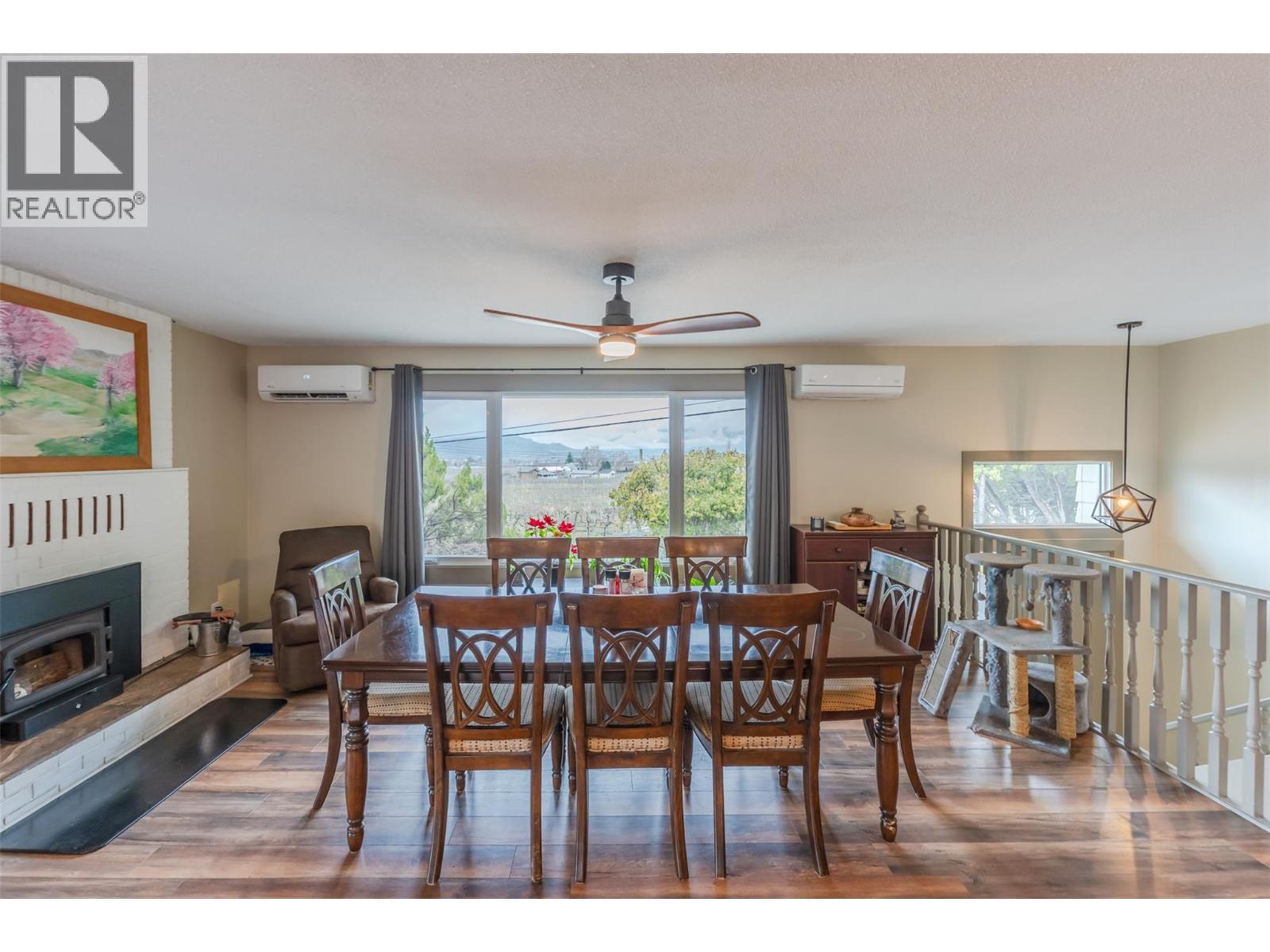 1418 Fairview Road, Oliver, BC - Indoor Photo Showing Dining Room With Fireplace