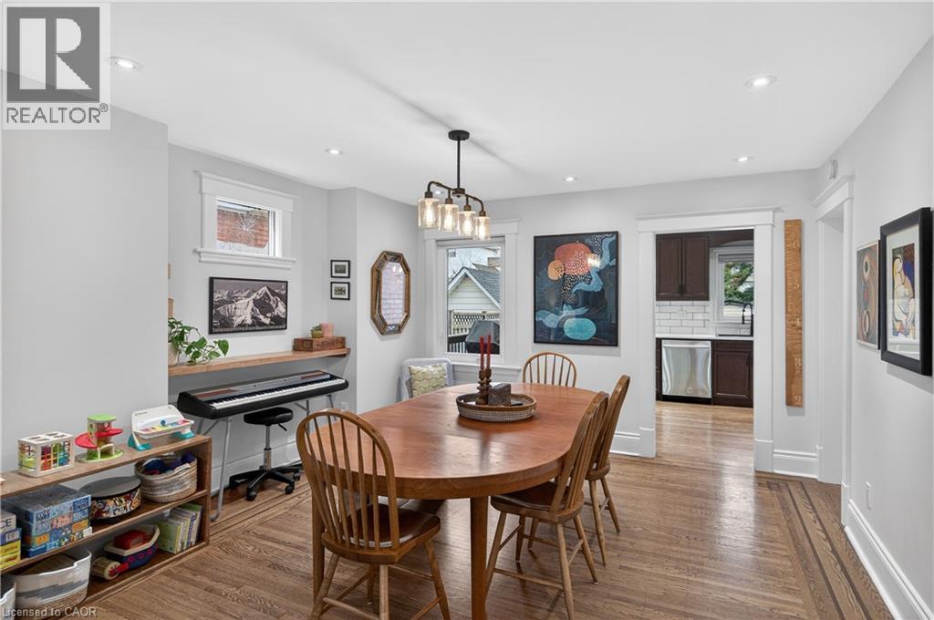 Dining room with wood finished floors and recessed lighting - 248 London Street S, Hamilton, ON - Indoor Photo Showing Dining Room