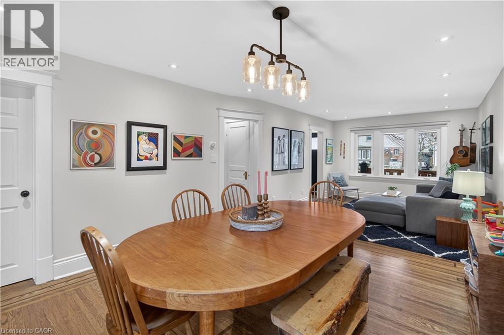 Dining room with wood finished floors and recessed lighting - 248 London Street S, Hamilton, ON - Indoor Photo Showing Dining Room