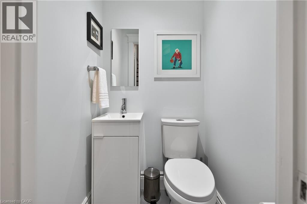 Bathroom with vanity and toilet - 248 London Street S, Hamilton, ON - Indoor Photo Showing Bathroom