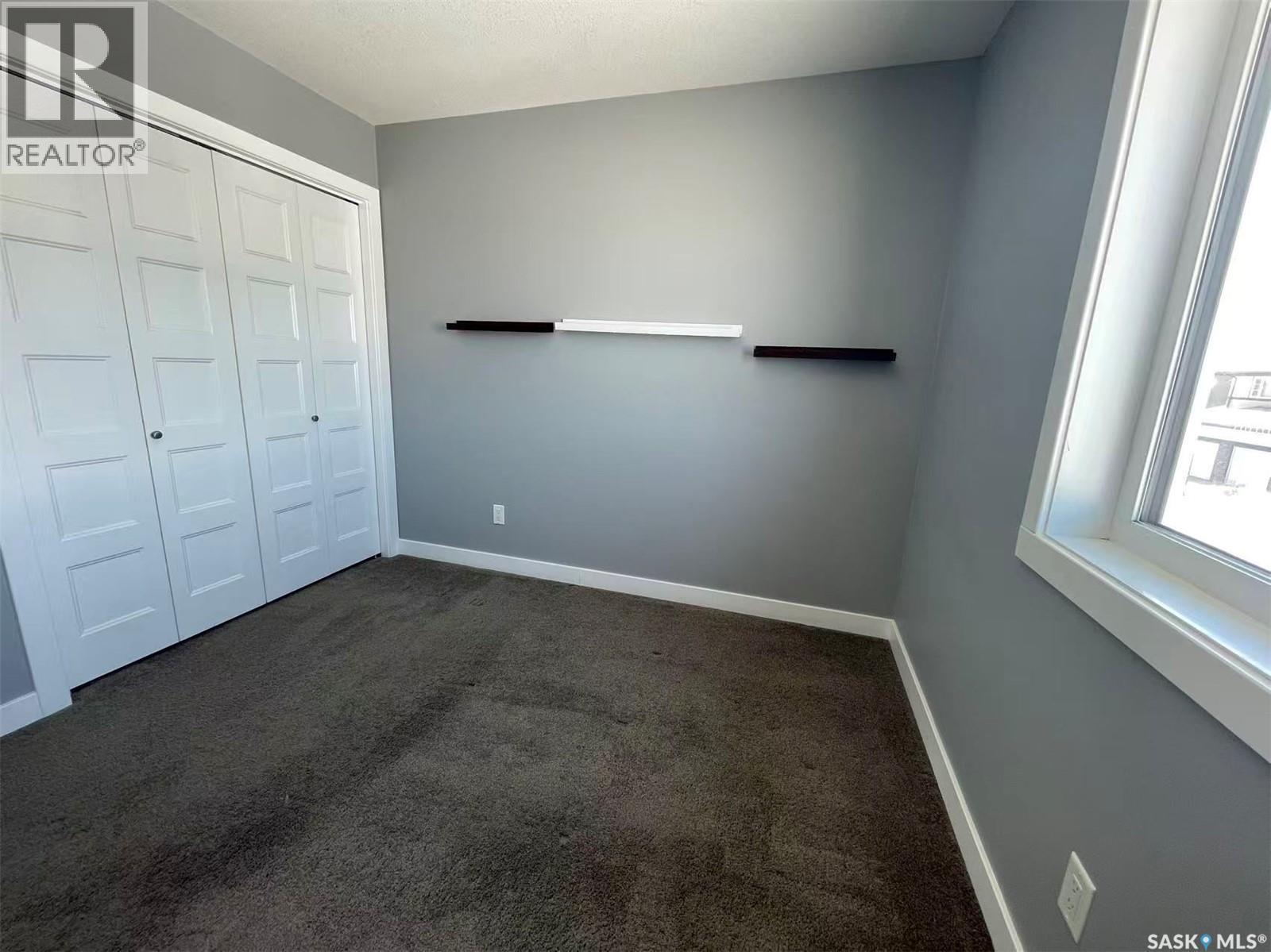 2 5301 Beacon Drive, Regina, SK - Indoor Photo Showing Other Room