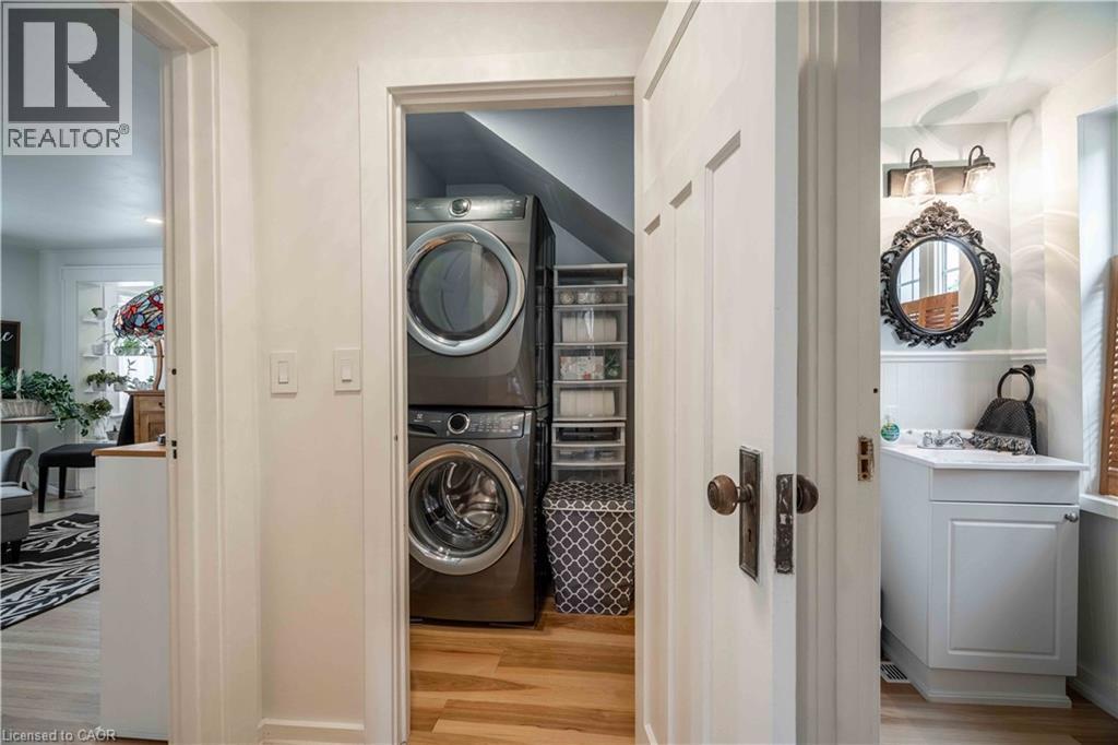 View of laundry/bath perspective from hallway. - 99 Argyle Street N, Caledonia, ON - Indoor Photo Showing Laundry Room