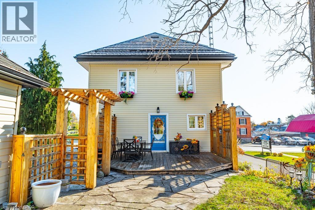 Seasonal view of back of home. - 99 Argyle Street N, Caledonia, ON - Outdoor With Deck Patio Veranda