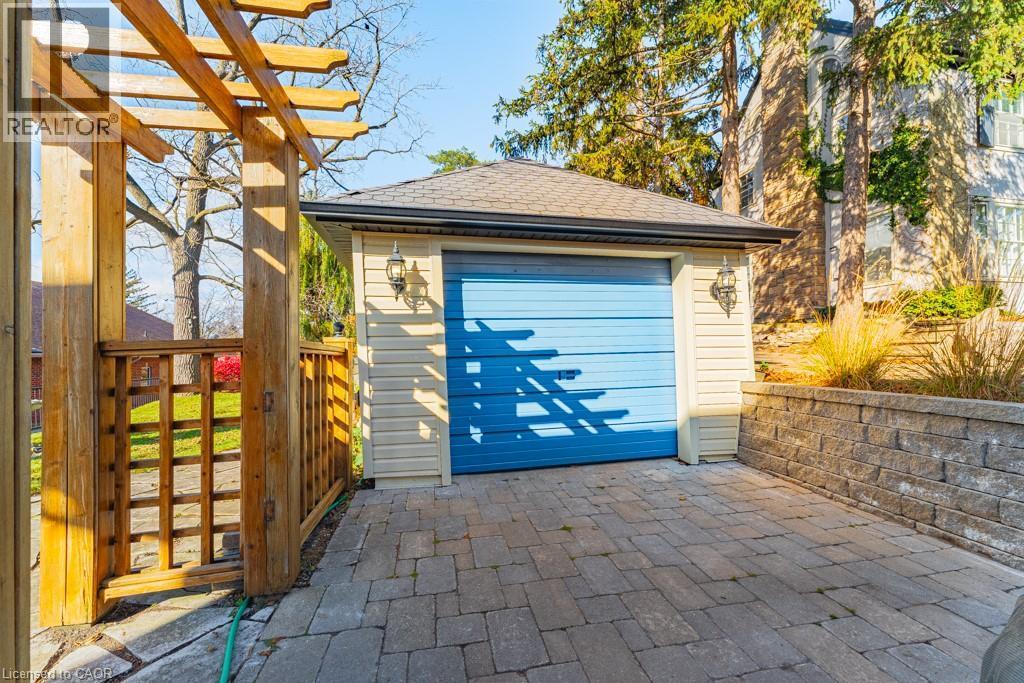 Single detached garage with new gar dr opener and separate man-door. - 99 Argyle Street N, Caledonia, ON - Outdoor