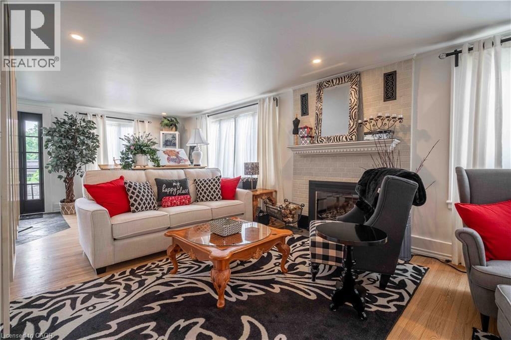 The Centre of the home Living Room - perfect for entertaining. - 99 Argyle Street N, Caledonia, ON - Indoor Photo Showing Living Room With Fireplace